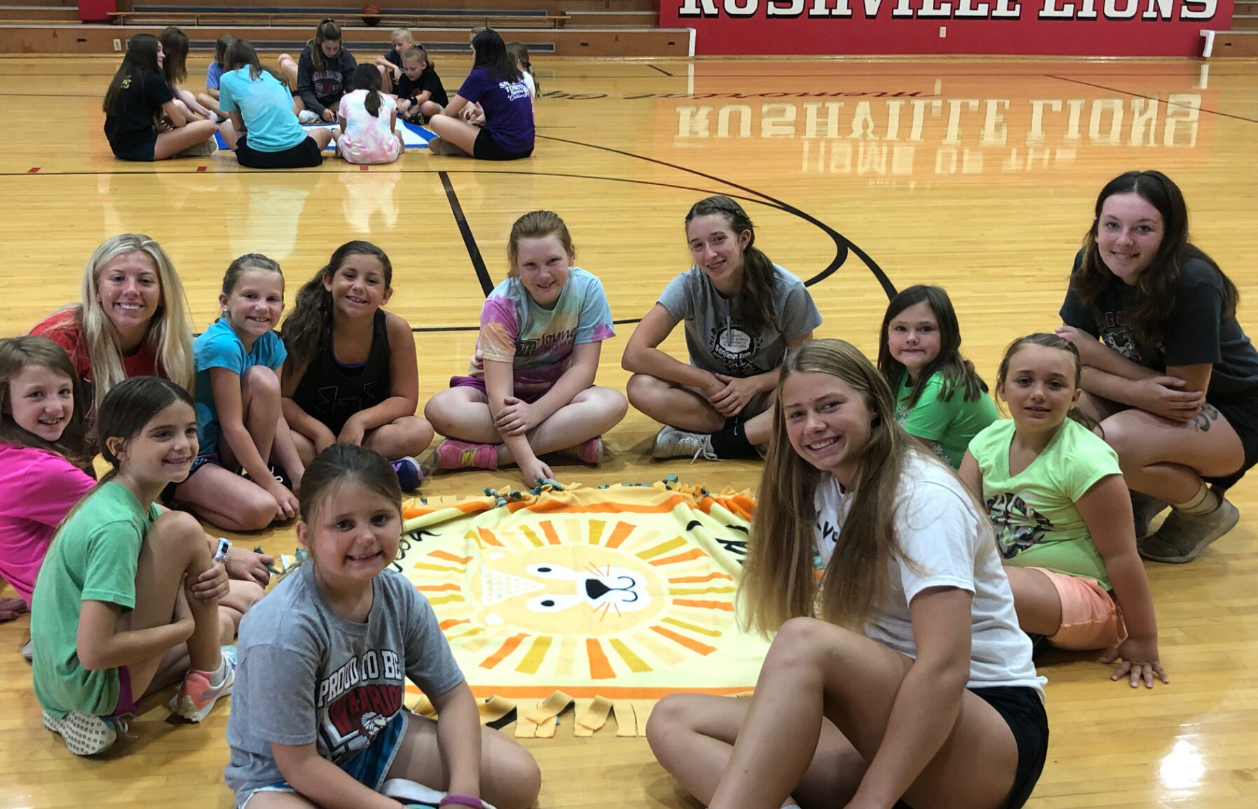 Campers make blankets for donation